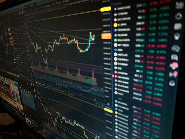 Crypto trading screen with charts and stock data. Starting a crypto exchange requires technical analysis.